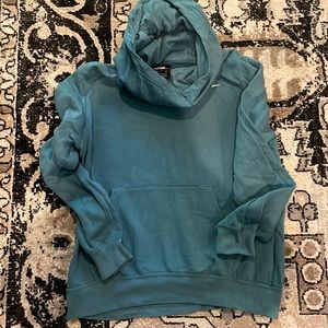 Nike teal pullover.